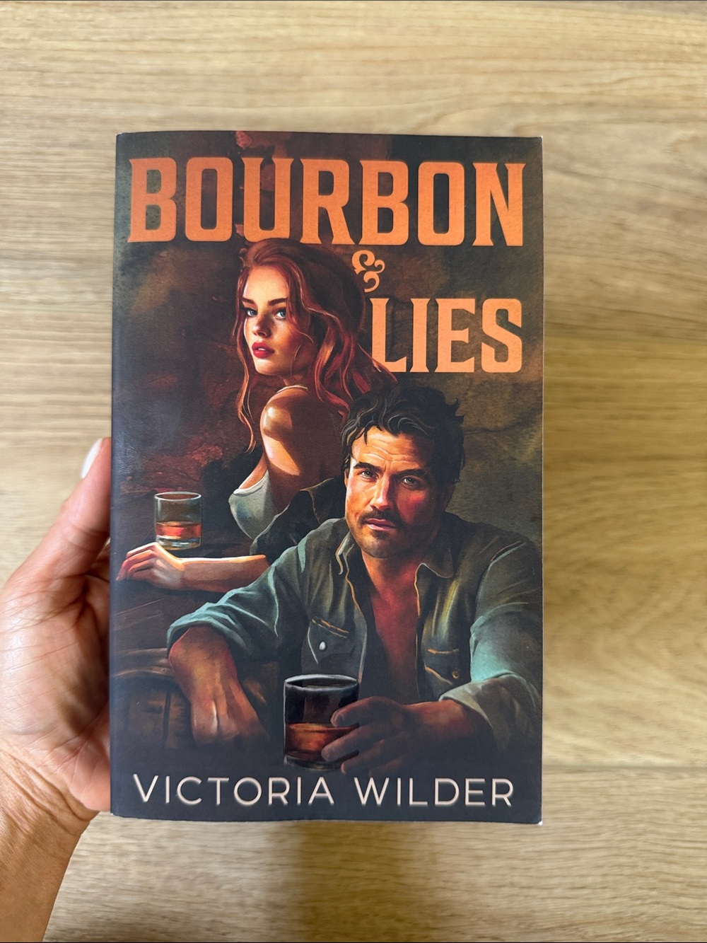 Bourbon & Lies by Victoria Wilder - Orange/Brown Cover